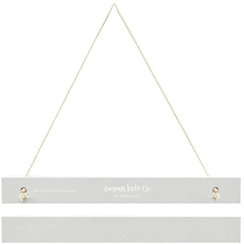 Close up of Emma Kate Co A4 magnetic art hanger hardware and string