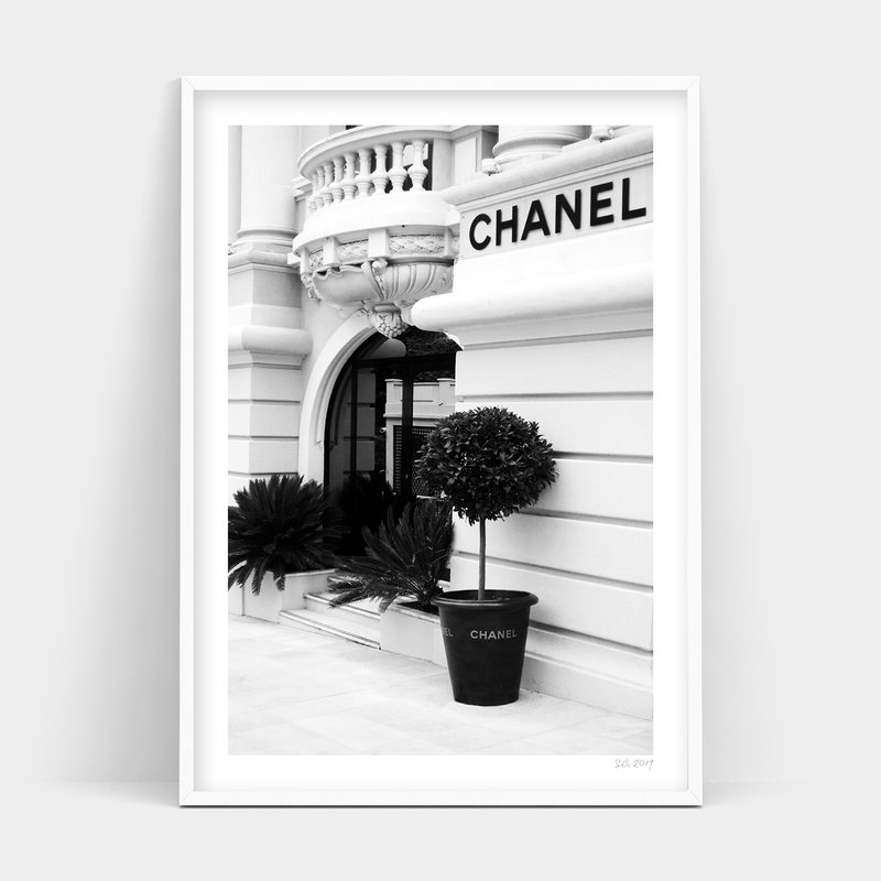 A black and white photo of a Make an Entrance building available for delivery as Art Prints or frames.