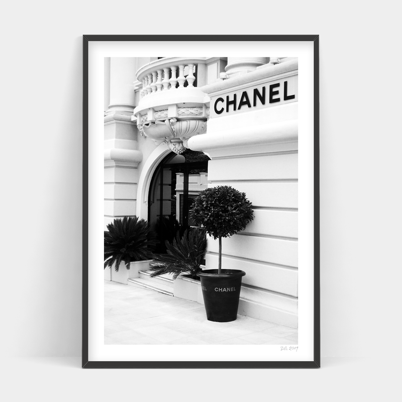 A black and white photo of a Make an Entrance building available for delivery as Art Prints prints and frames.