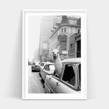 A black and white photo of a New York Taxi by Art Prints available for prints and delivery.