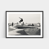 A black and white photo of a skateboarder in the Oceanfront Park, available for prints and delivery by Art Prints.