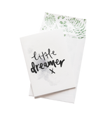A greeting card featuring the words "little dreamer" by Emma Kate Co.