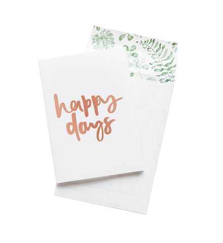 A brand new Emma Kate Co white greeting card with the words Happy Days on it.