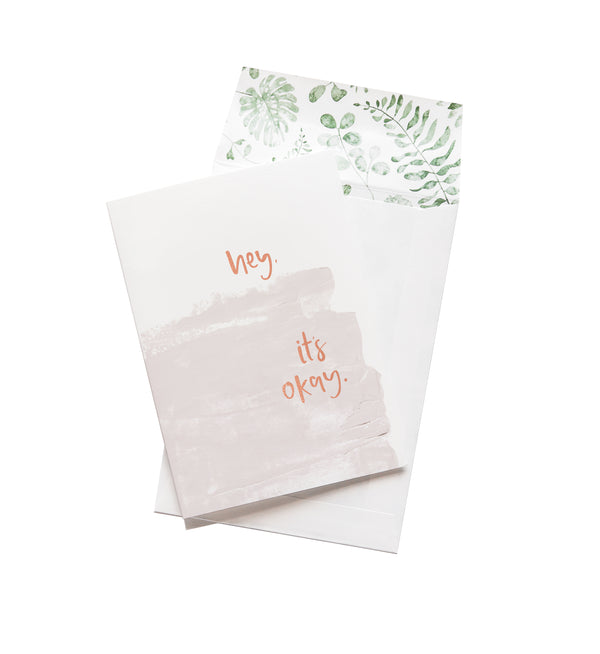A HEY, IT’S OKAY. greeting card from the Wild Hearts collection by Emma Kate Co with the words 'you're welcome' on it.