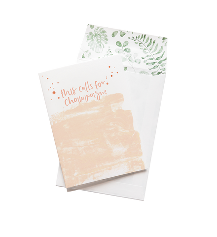 A This Calls For Champagne greeting card from Emma Kate Co.'s WILD HEARTS collection with the words 'you're welcome' on it.