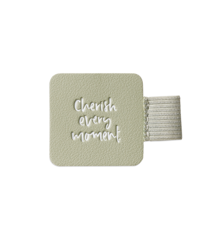 A small self-adhesive square with the words 'clear every wonder' on it, perfect for Emma Kate Co Avocado Pen Holders.