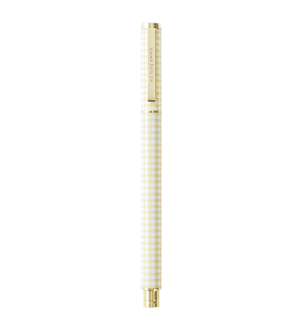 An Emma Kate Co Metal Rollerball Pen in Butter Gingham with gold metal hardware on a black background.