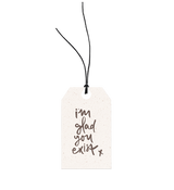 Handcrafted Glad You Exist gift tag featuring hemp twine and art stock by Emma Kate Co.