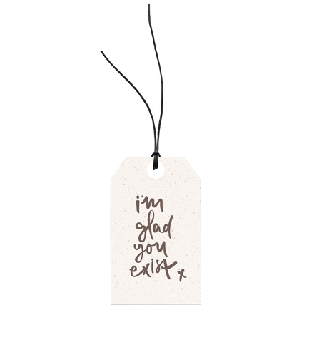 Handcrafted Glad You Exist gift tag featuring hemp twine and art stock by Emma Kate Co.
