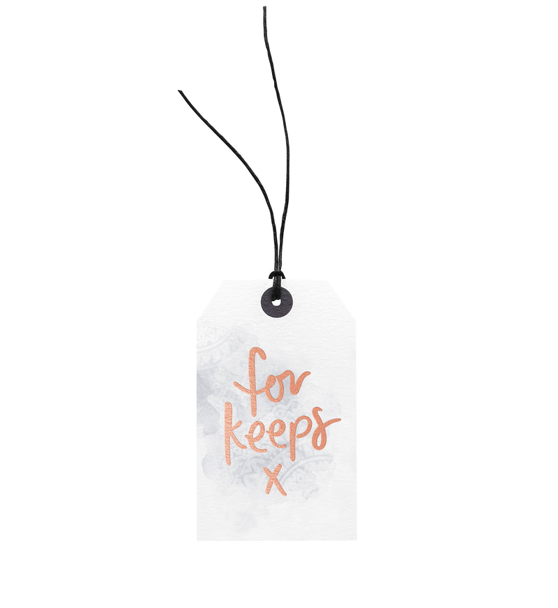 A For Keeps gift tag attached with European hemp twine, made by Emma Kate Co.