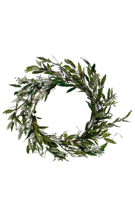 A Dried-Look Olive Leaf Wreath 68cm wreath of green leaves on a white background, available for Special Order from Christmas '23.