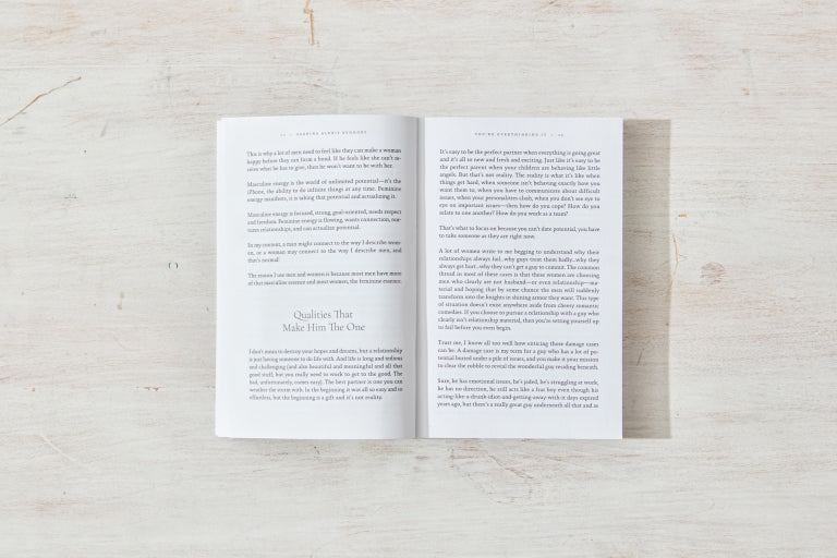 Book open to a spread of text on timber