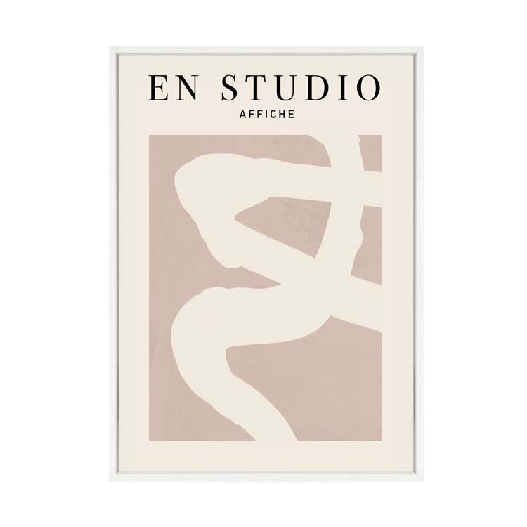 En Studio print in a white frame
