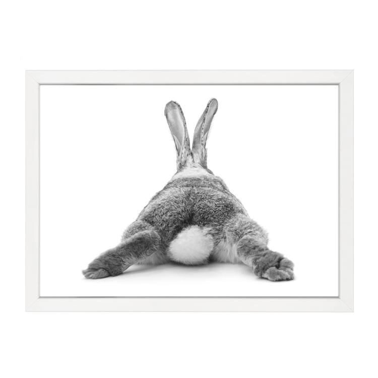 Playful bunny bum nursery wall art print by Papier HQ framed in white