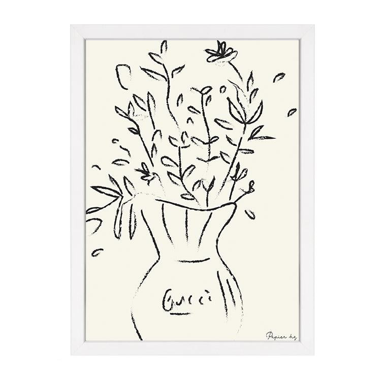 Black line sketch of flowers in a vase on cream, in a white frame