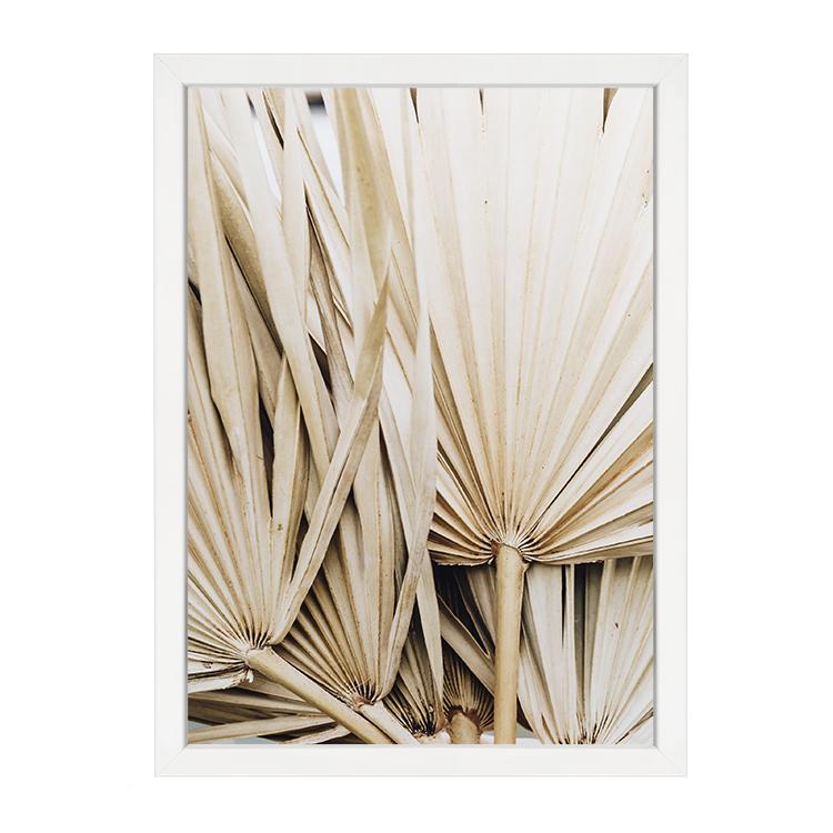 Botanical dried palm leaves wall art print by Papier HQ framed in white