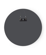 A black circle with a black bag hanging on it, part of the Umbra Hub Mirror - Bevy 24inch - Smoke range.