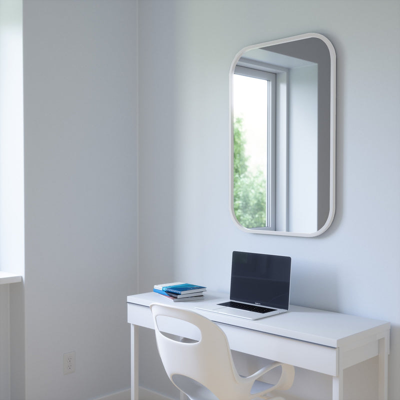 A white desk from the Umbra range with a HUB RECTANGLE MIRROR - WHITE above it.