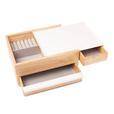 An Umbra STOWIT JEWELRY BOX NATURAL with two storage drawers.