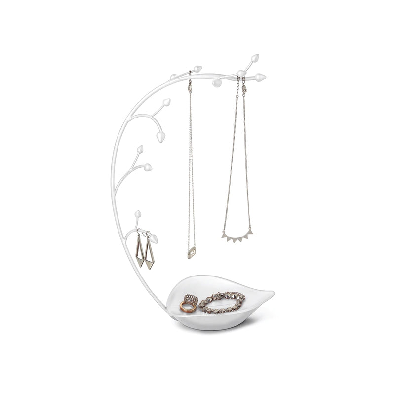 A white Umbra orchid jewelry stand with an Umbra range of necklaces on it.