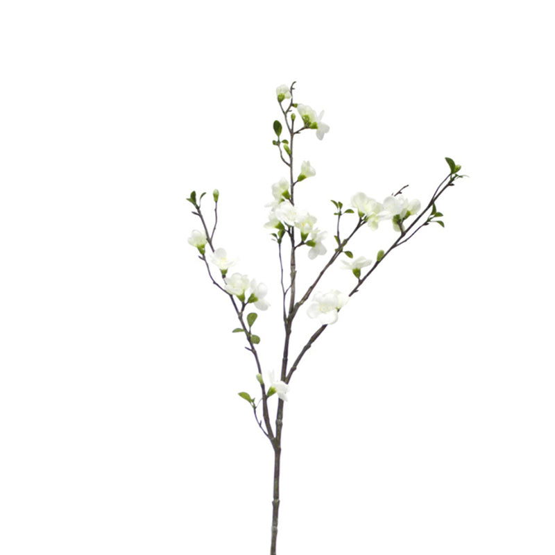 A white Apple Blossom Spray White on a branch surrounded by Artificial Flora plants and foliage sprays, all set against a white background.