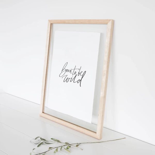 An eco-friendly AXEL & ASH Born to be Wild print with the words 'be still and know that i am loved', perfect for art prints enthusiasts with a wanderlust-spirit.