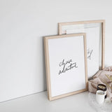 Two AXEL & ASH Chase Adventure Prints with the words 'love yourself' on them, part of an eco-friendly range.