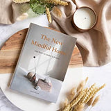 The new mindful home with a charming book collection from Books on a wooden table.