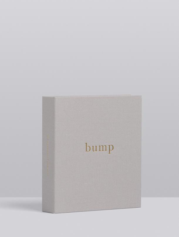 Angled view of the Bump keepsake box showing its depth in light grey linen