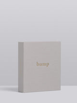 A box with the word BUMP | MY PREGNANCY JOURNAL | LIGHT GREY on it, representing a pregnancy journey by Write To Me.