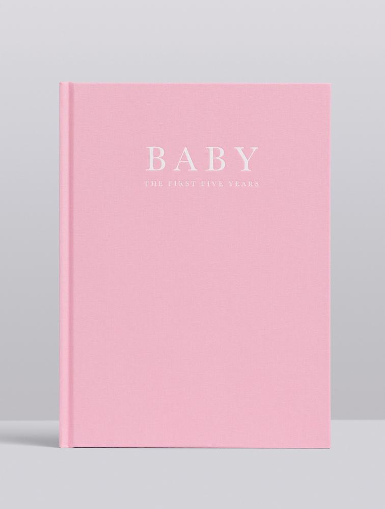Pink linen Write To Me Baby Journal with the word baby on the cover