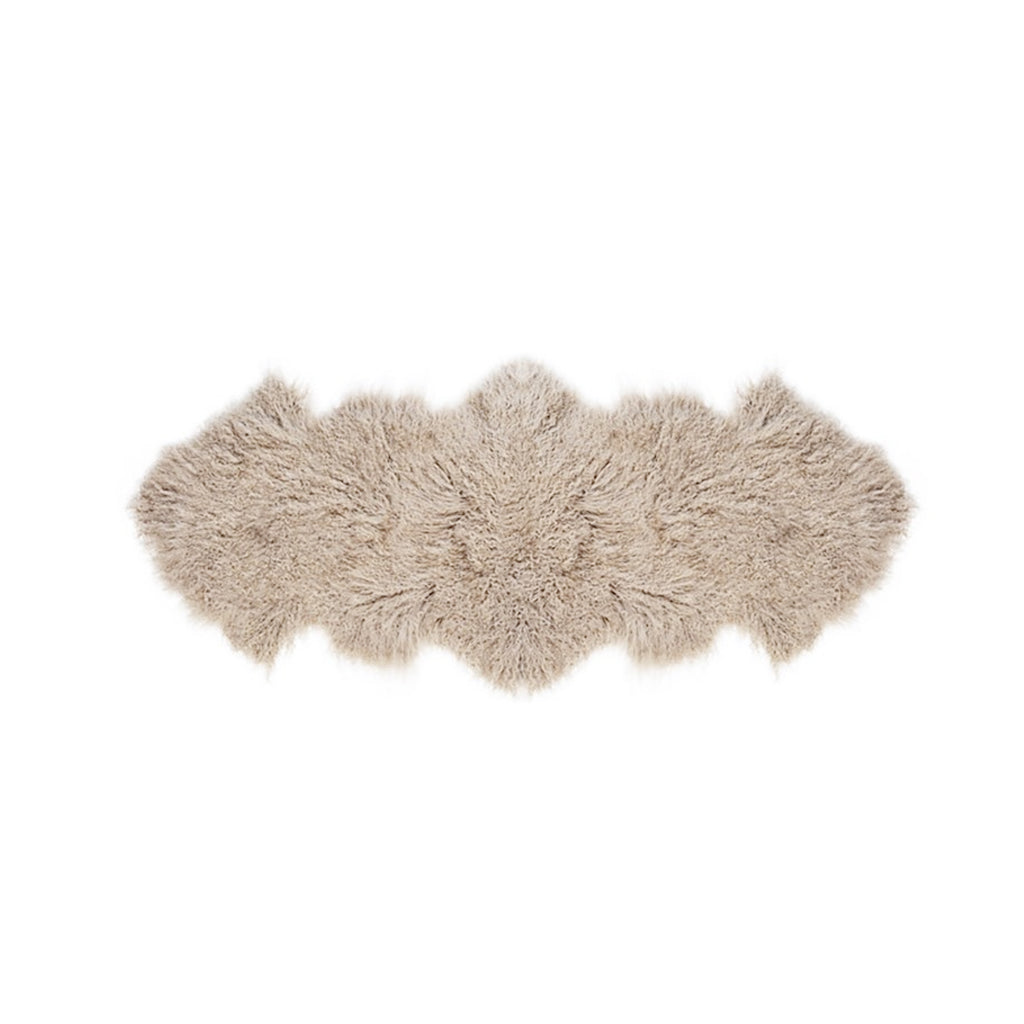 Tibetan lamb fur double rug in a soft taupe tone on a white background