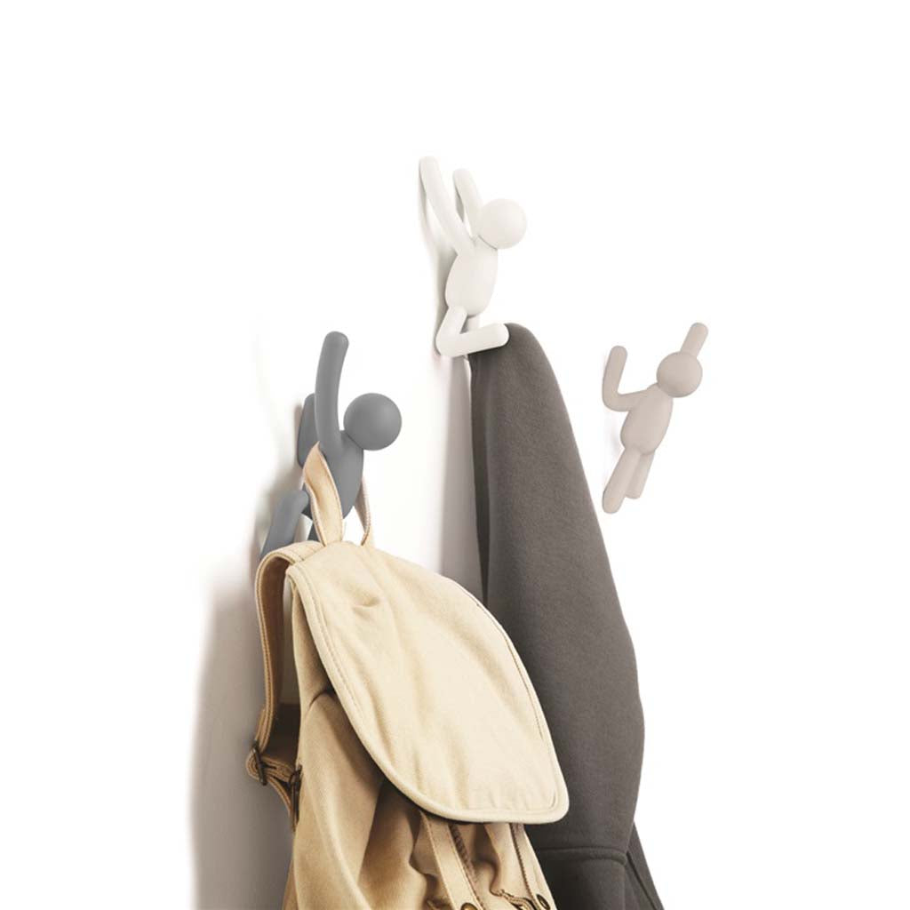 Umbra Buddy Hooks in multi grey holding a backpack