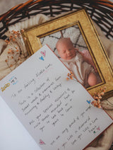 A Write To Me CARDS FOR KEEPS mother's day card with a photo of a baby in a basket.