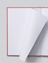 A white CARDS FOR KEEPS notebook with a red cover on a grey background by Write To Me.