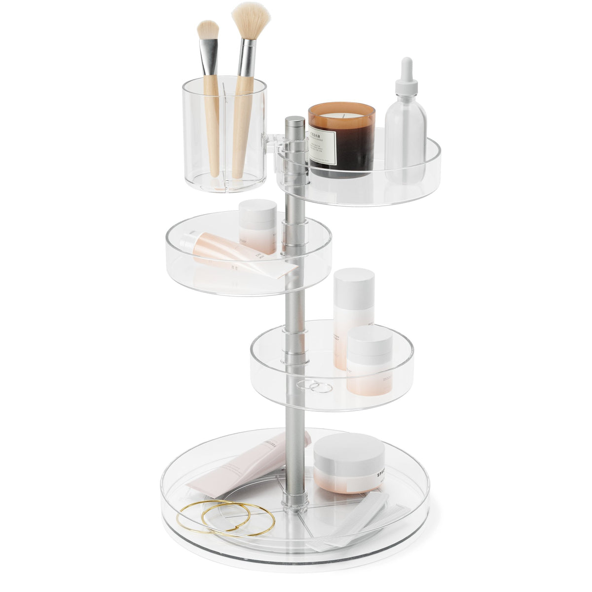 Umbra Pirouette rotating organiser filled with brushes, skincare and cosmetics