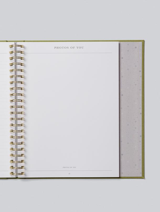 Childhood journal open to a blank Photos of You page