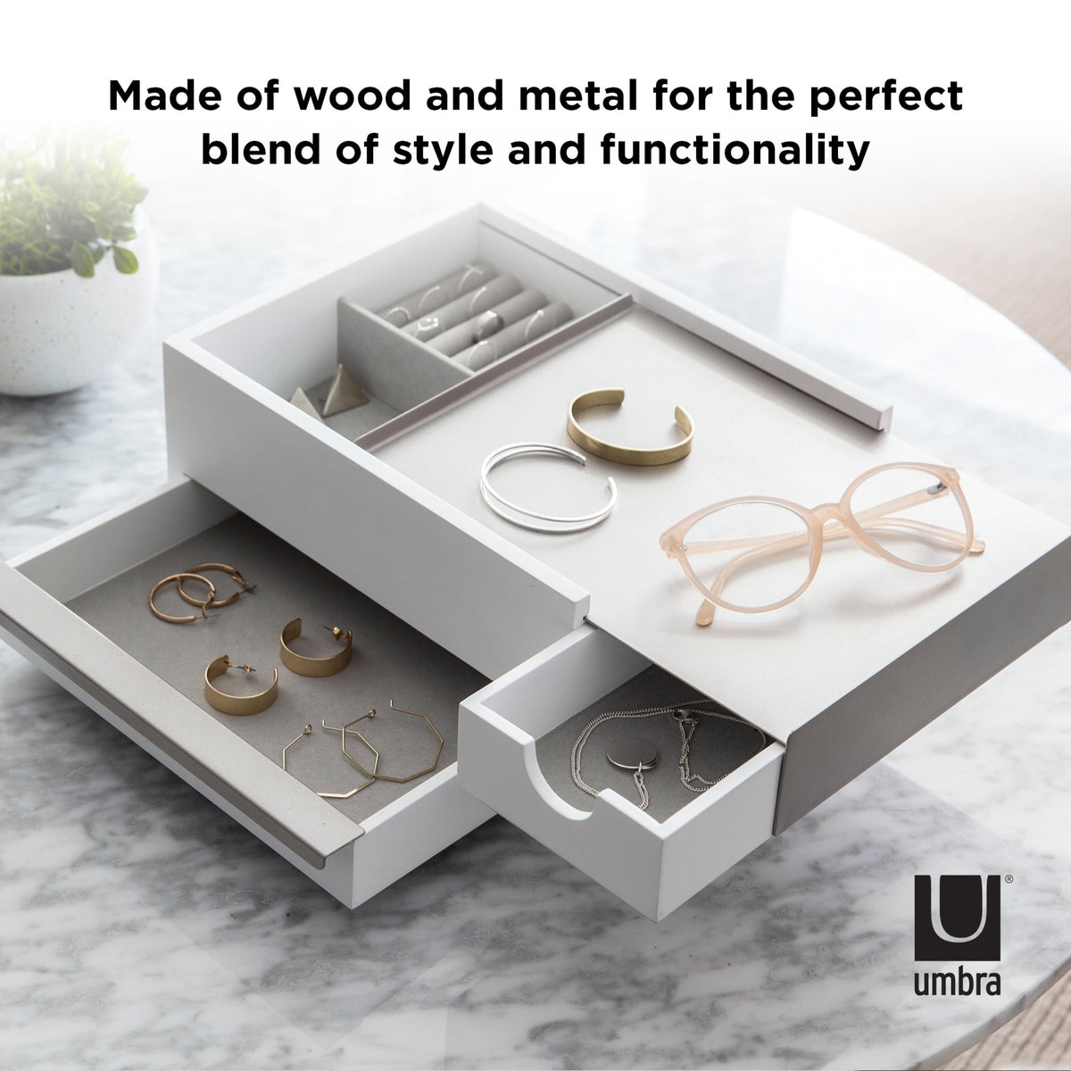 Umbra Stowit jewellery box in white holding rings, earrings and glasses