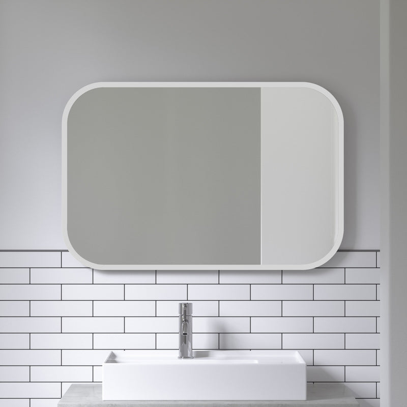 A white bathroom with a white sink and the Umbra Hub Rectangle Mirror - White.