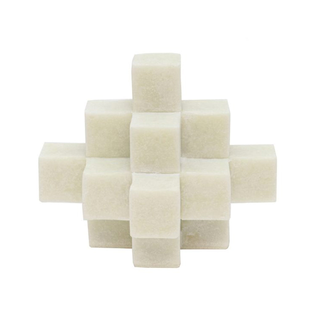 Cubism sculpture in cream resin, front view on a plain background