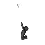 A black Umbra Buddy Over The Door Hook Black figurine with a letter f hanging from it.
