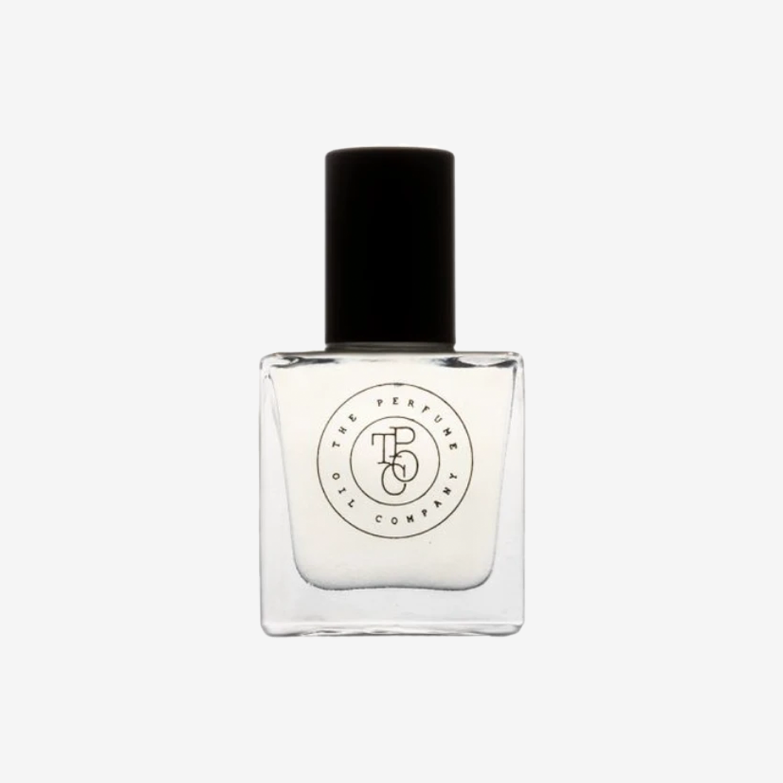 Square perfume oil bottle with a black cap on a pale grey background