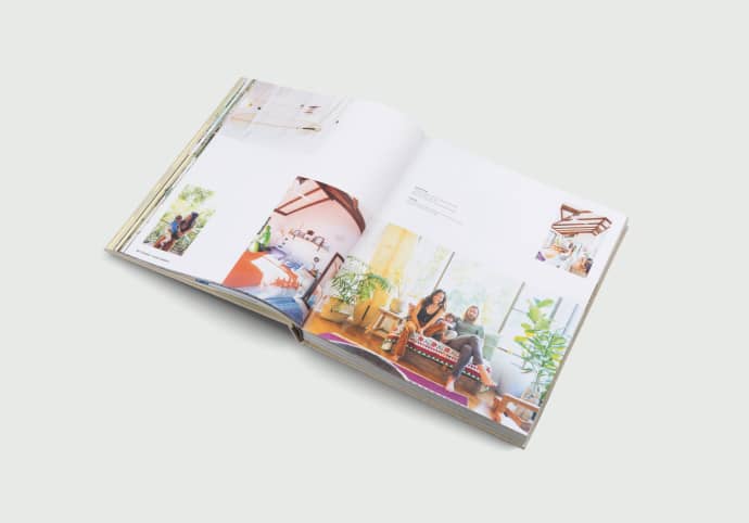 Surf Shacks Volume 2 open to a spread of a sunny, plant-filled home
