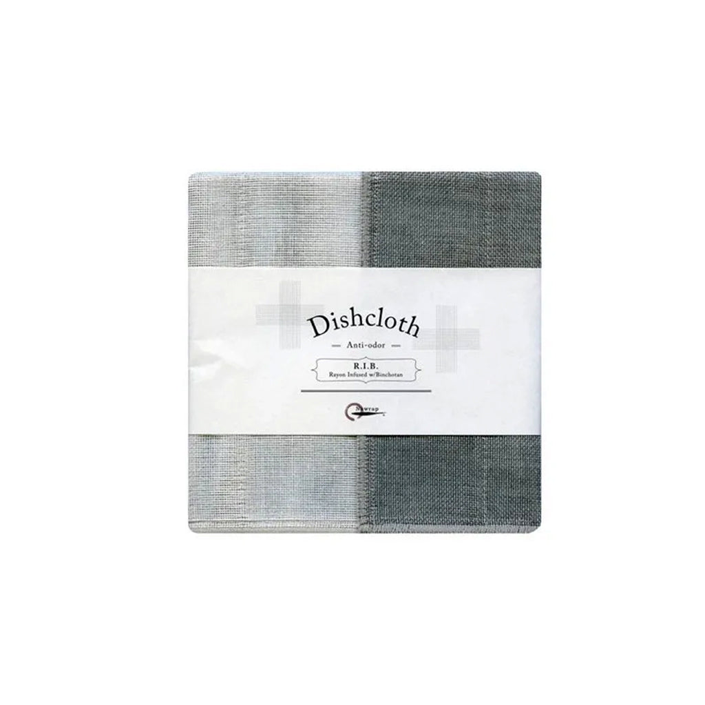 Nawrap Rib Dishcloth in White in its packaging, showing the grey and white ribbed weave