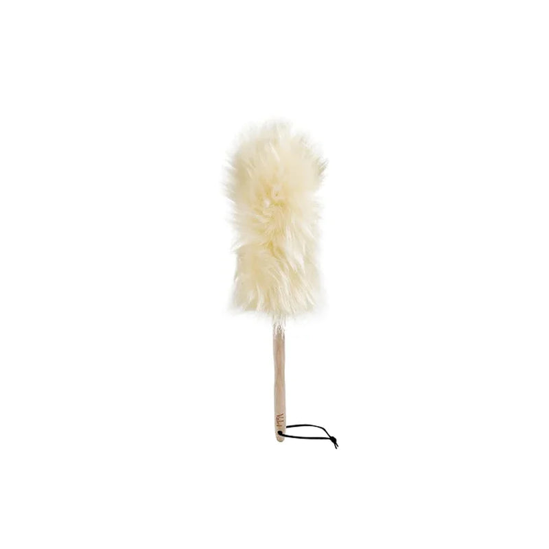 A Florence LAMBS WOOL DUSTER - MED with a wooden handle.
