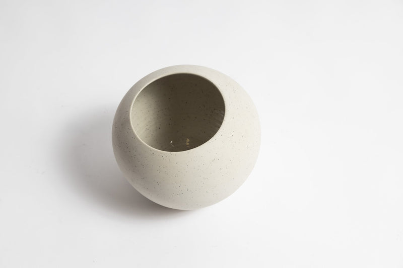 A unique Ronnie Vase crafted by skilled craftsmen on a pottery wheel from Ned Collections.