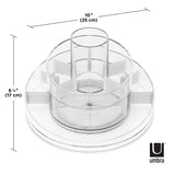 An Umbra clear plastic bowl with measurements on it, featuring a rotating base.