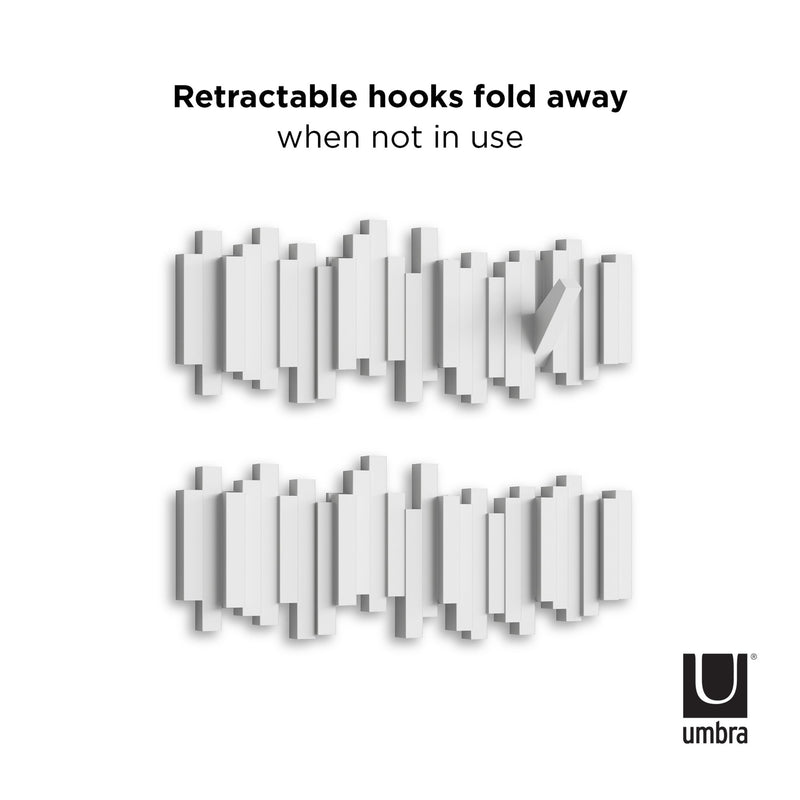 These Sticks Multi Hooks - White on the Umbra wall coat rack provide convenient home organization and easily fold away when not in use.