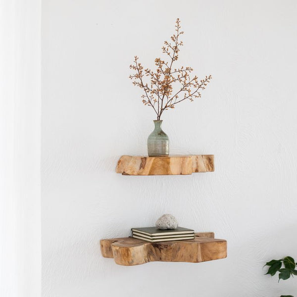 Two Reclaimed Teak Rustic Floating Shelves - Curved - Small / Large by Flux Home on a wall with a vase on them, exuding rustic warmth.