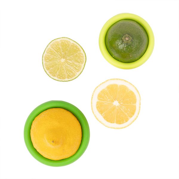 Three lemons and limes stored in SET OF 2- CITRUS, staying fresh longer.